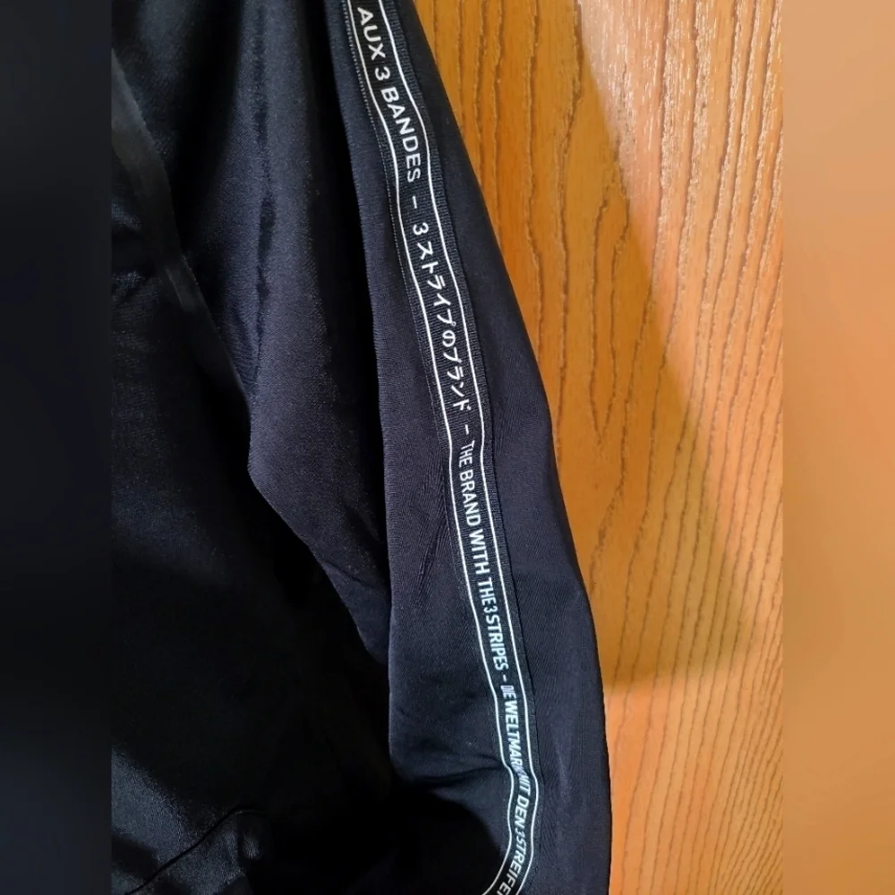 Adidas The Brand with the 3 Stripes logo tape zip up streetwear track jacket